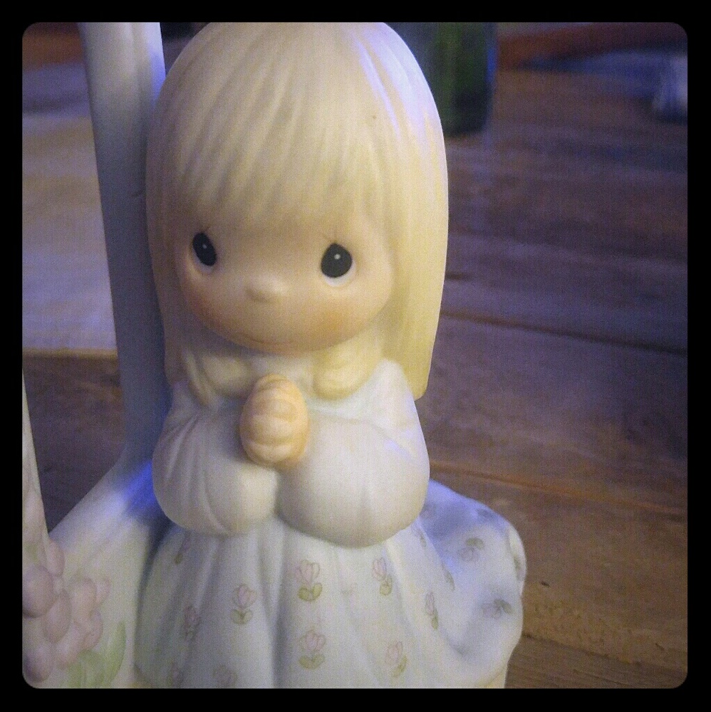 Precious moments girl praying